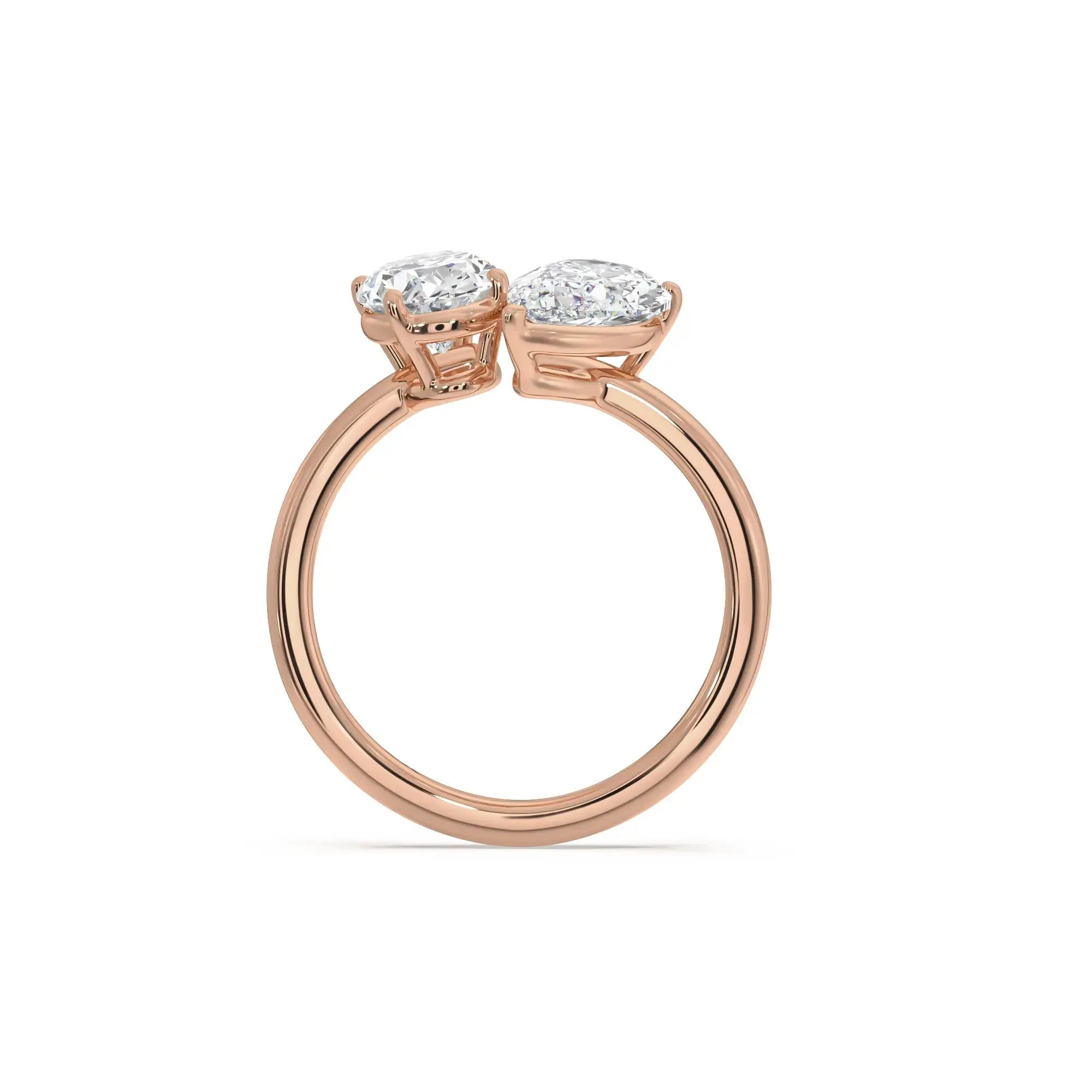 Noura Toi et Moi Diamond Engagement Ring featuring two diamonds side by side on a rose gold twisted band.