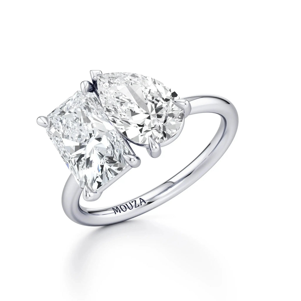 Arya Toi et Moi Platinum Diamond Engagement Ring Hatton Garden with brand name Mouza on the band