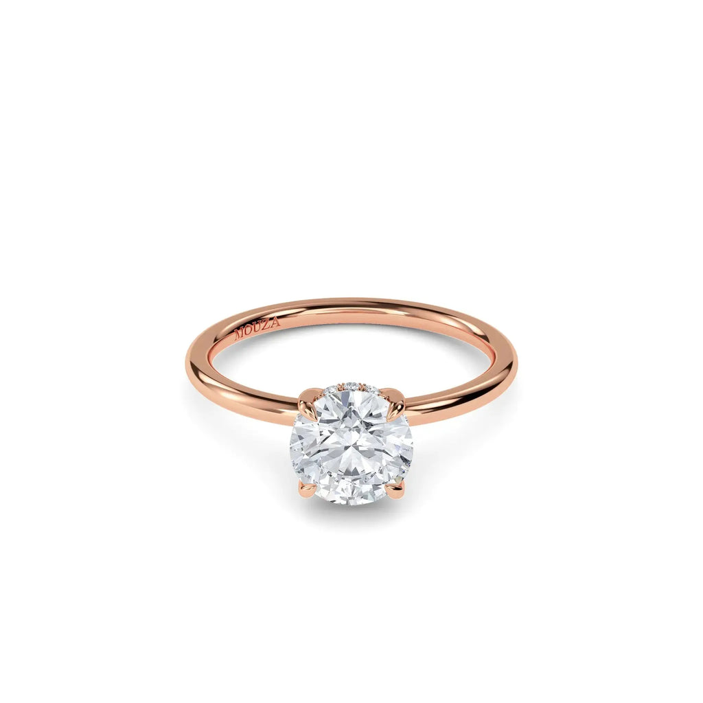 1.00ct Lab Grown Diamond Round Solitaire Hidden Halo Engagement Ring with brand name Mouza on the band