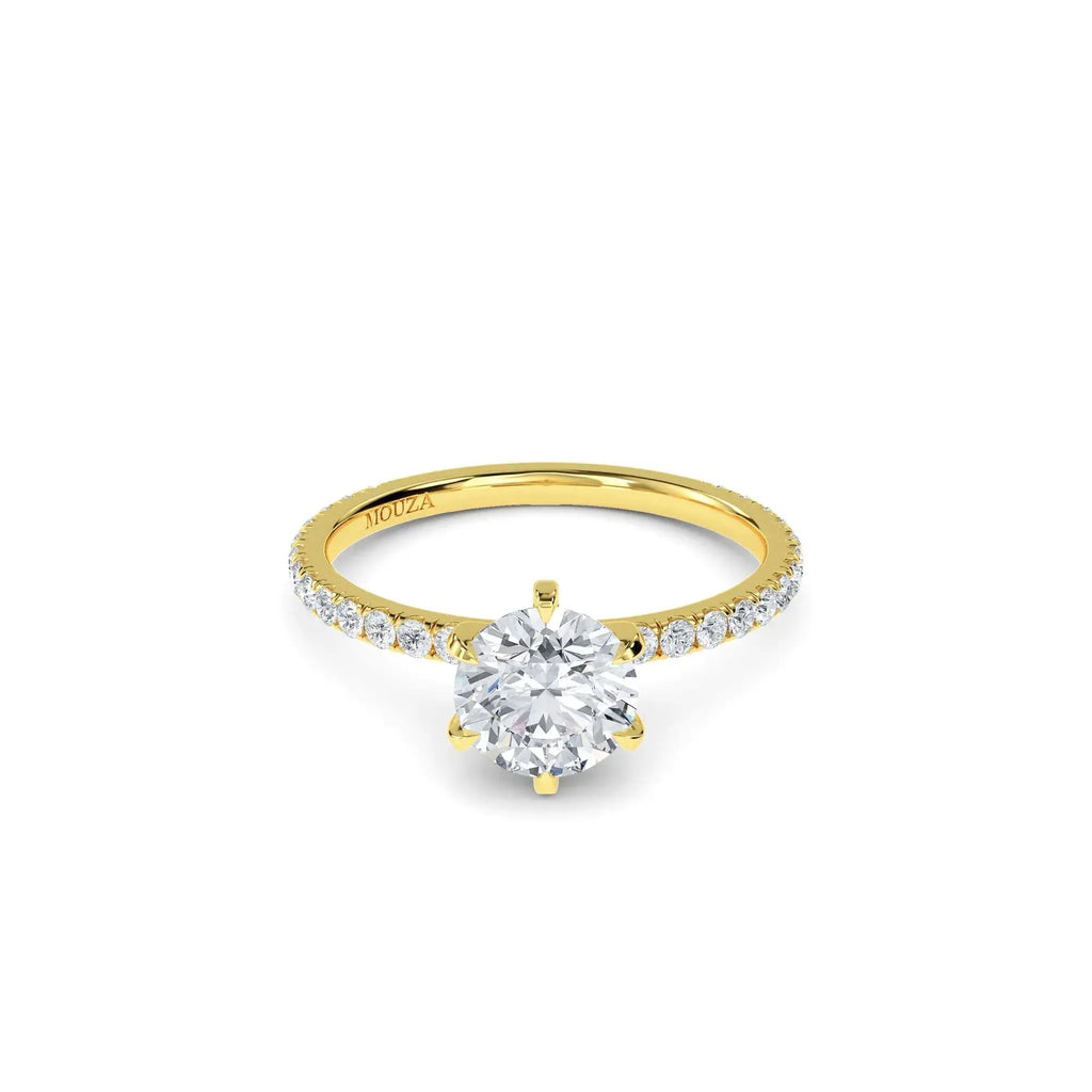 Round diamond band engagement ring in yellow gold