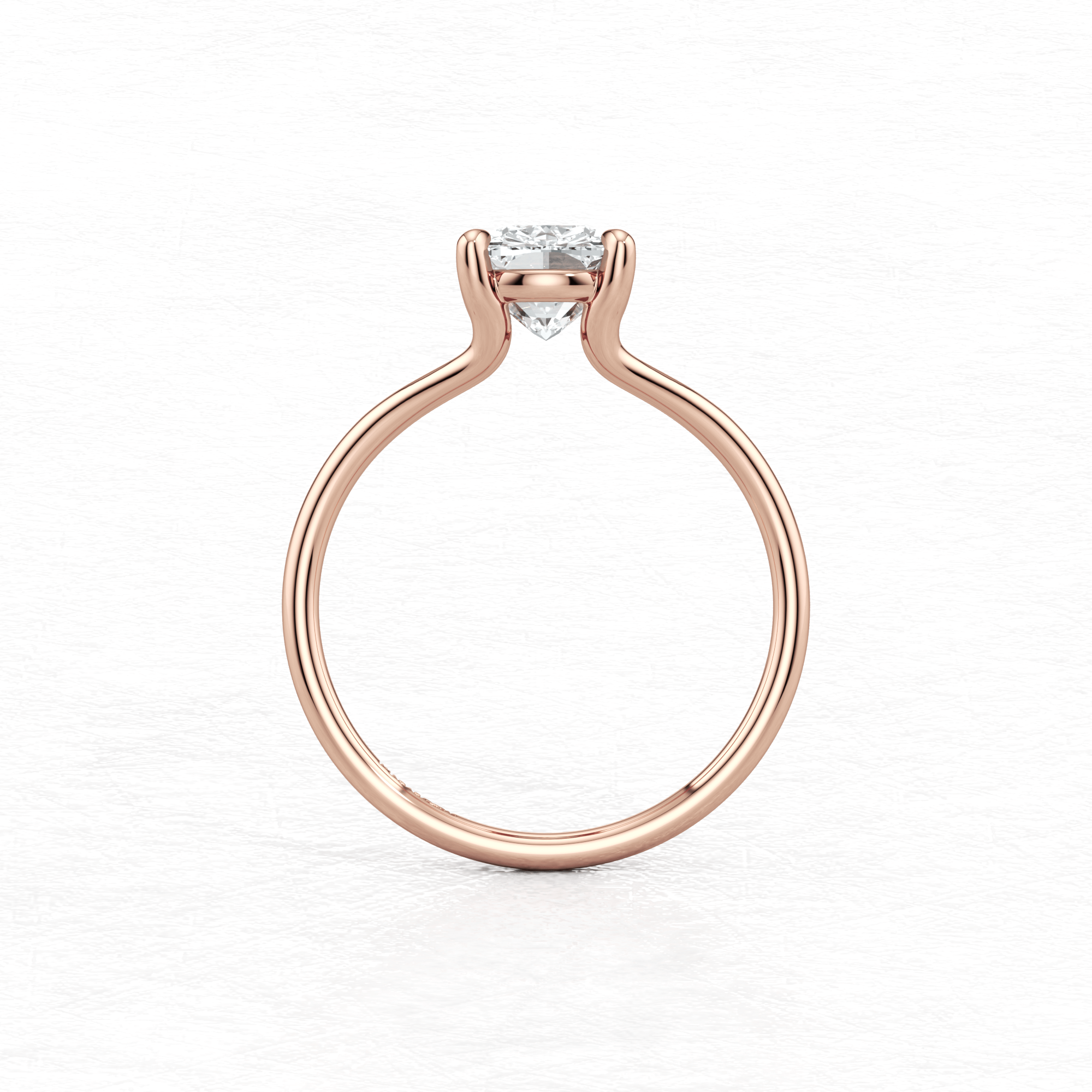 Rose Gold Maggy Solitaire Engagement Ring having a sleek contemporary design