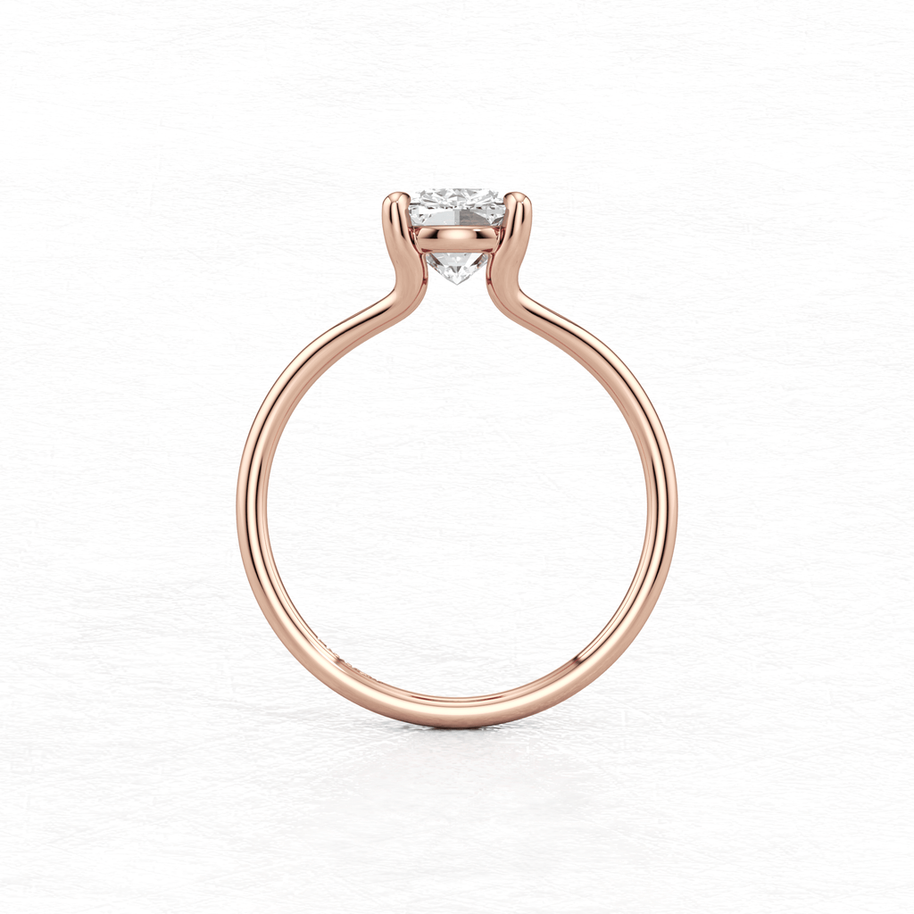 Rose Gold Maggy Solitaire Engagement Ring having a sleek contemporary design