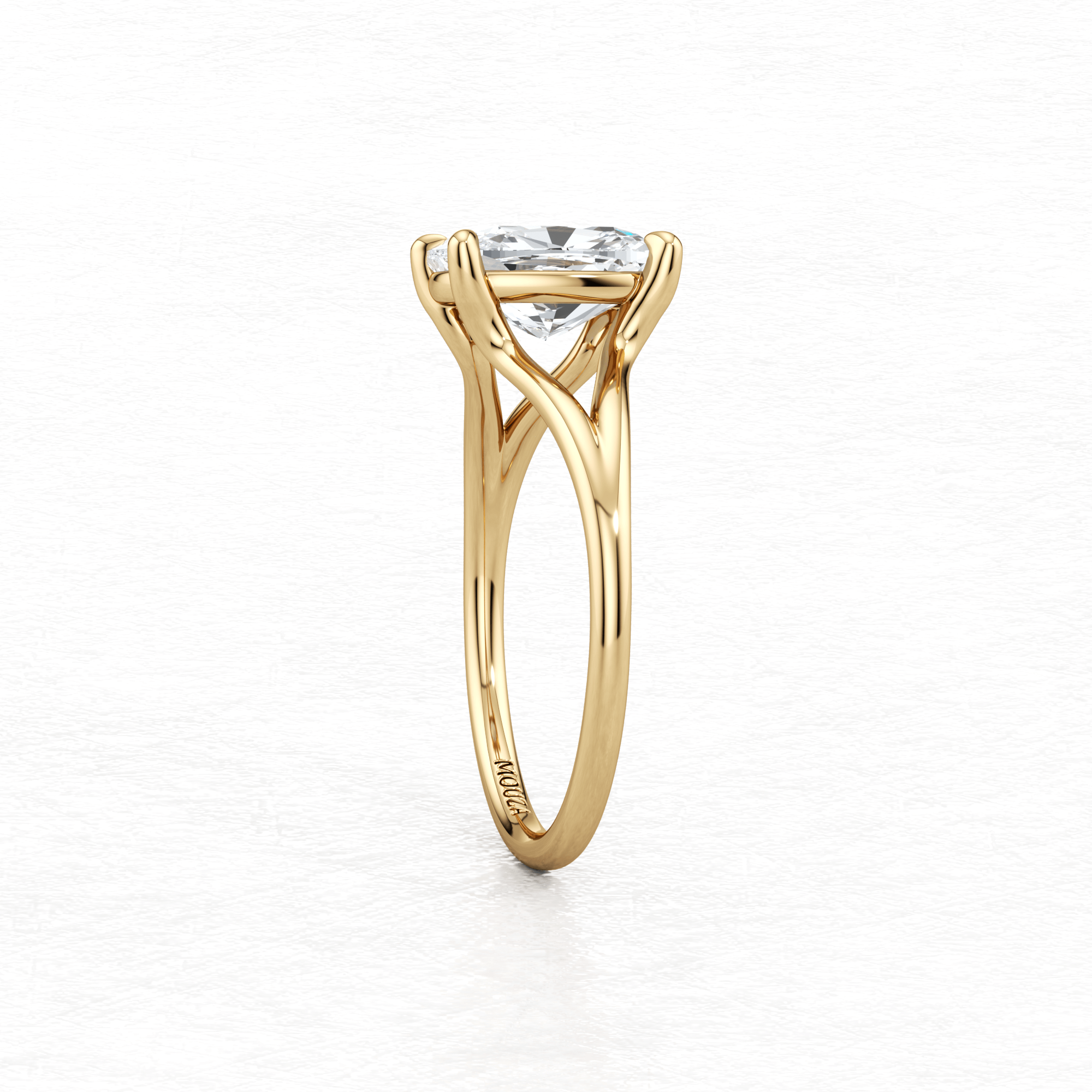 Maggy Solitaire Engagement Ring in Yellow Gold with brand name Mouza on the metal band