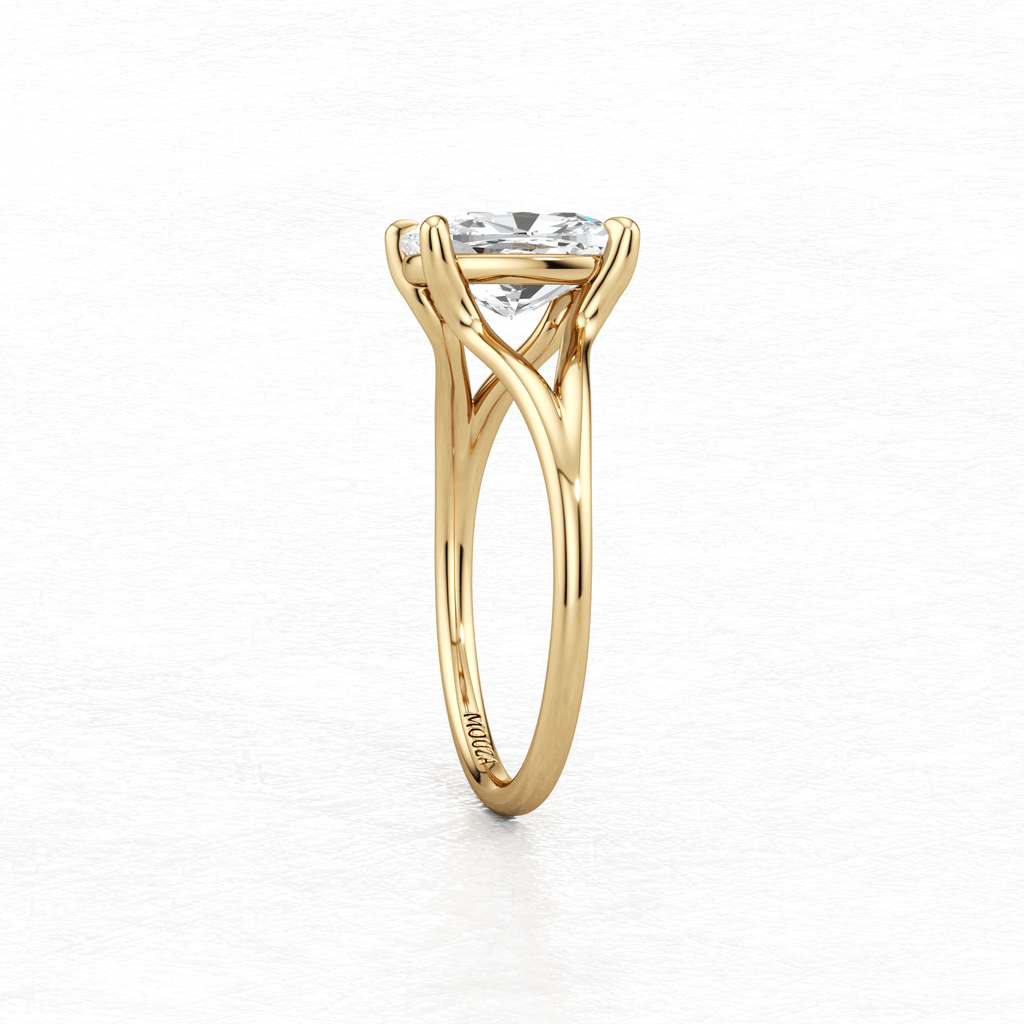 Maggy Solitaire Engagement Ring in Yellow Gold with brand name Mouza on the metal band
