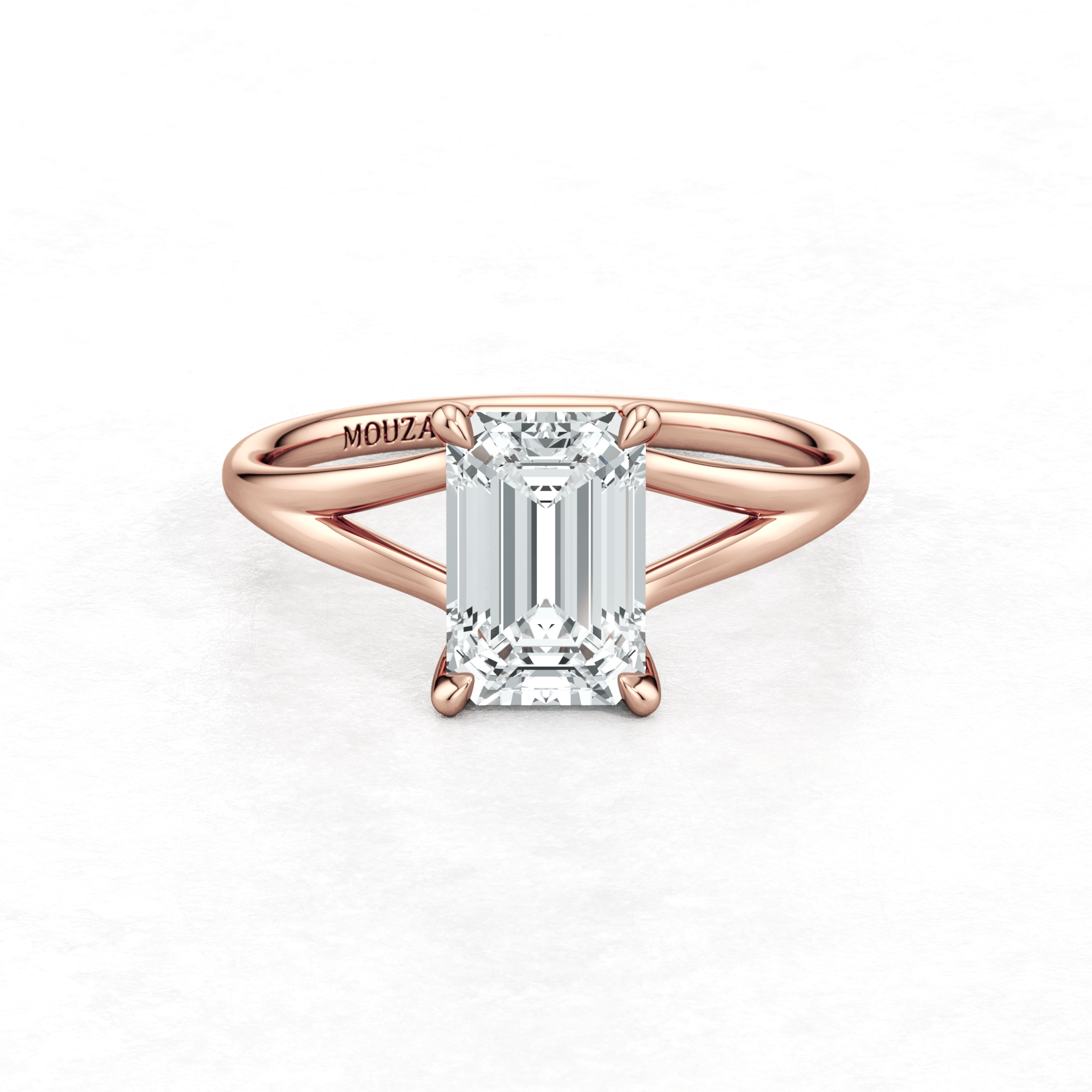 Rose Gold Maggy Solitaire Engagement Ring having a sleek and contemporary design with brand name Mouza engraved ont the metal band.