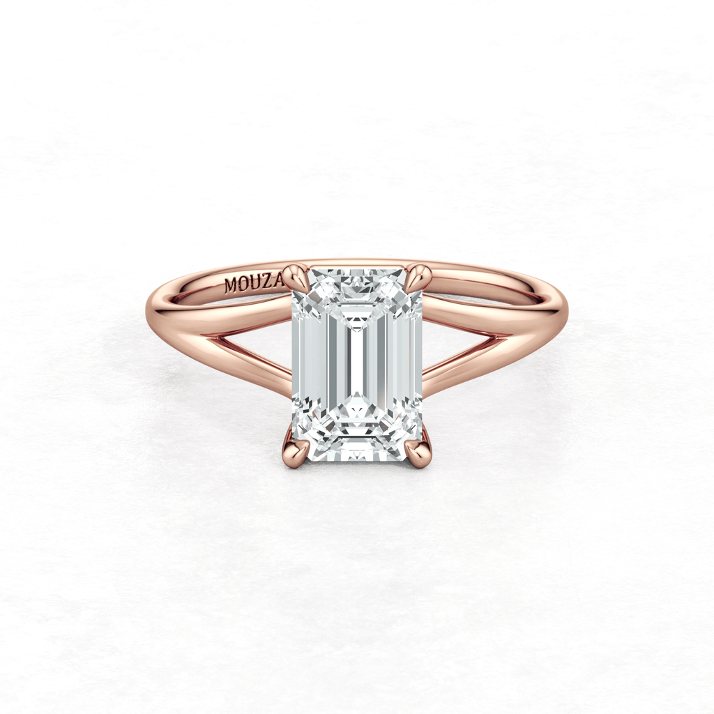 Rose Gold Maggy Solitaire Engagement Ring having a sleek and contemporary design with brand name Mouza engraved ont the metal band.