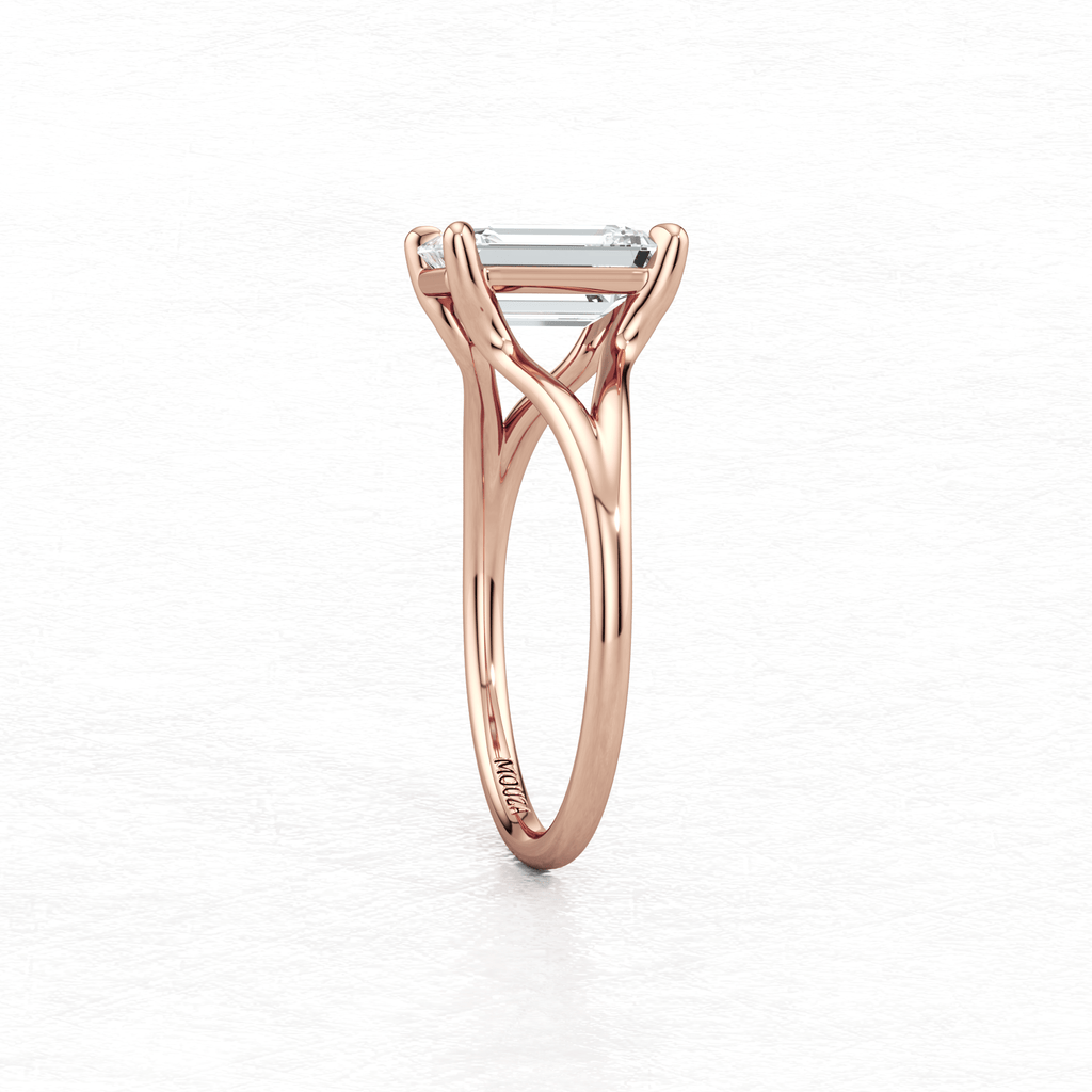Maggy Solitaire Engagement Ring having a sleek contemporary design and brand name Mouza engraved on the rose gold metal band.