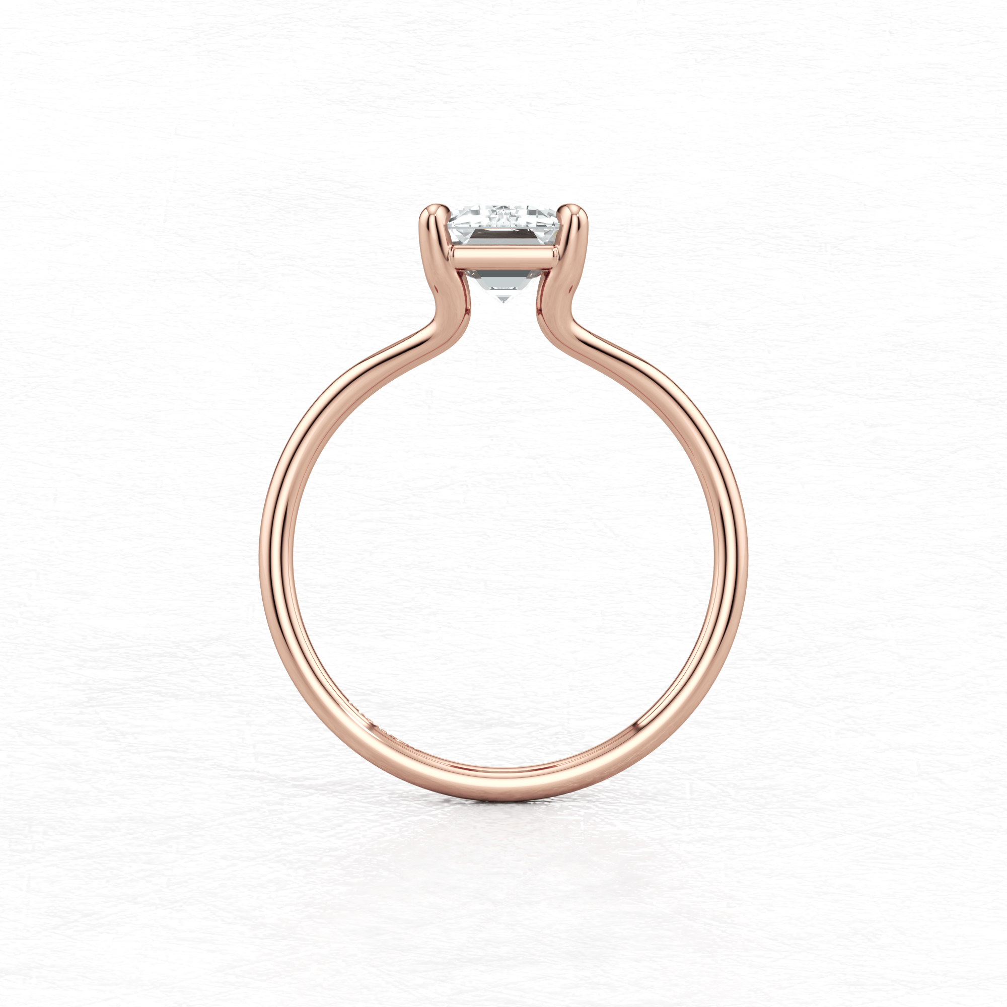 Maggy Solitaire Engagement Ring having a sleek contemporary design