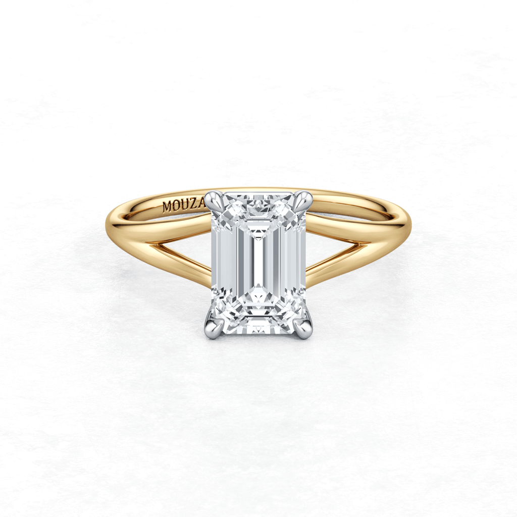 Elegant Two Tone Maggy Solitaire Engagement Ring featuring a split shank that elegantly frames the centre stone from Mouza, Hatton Garden.