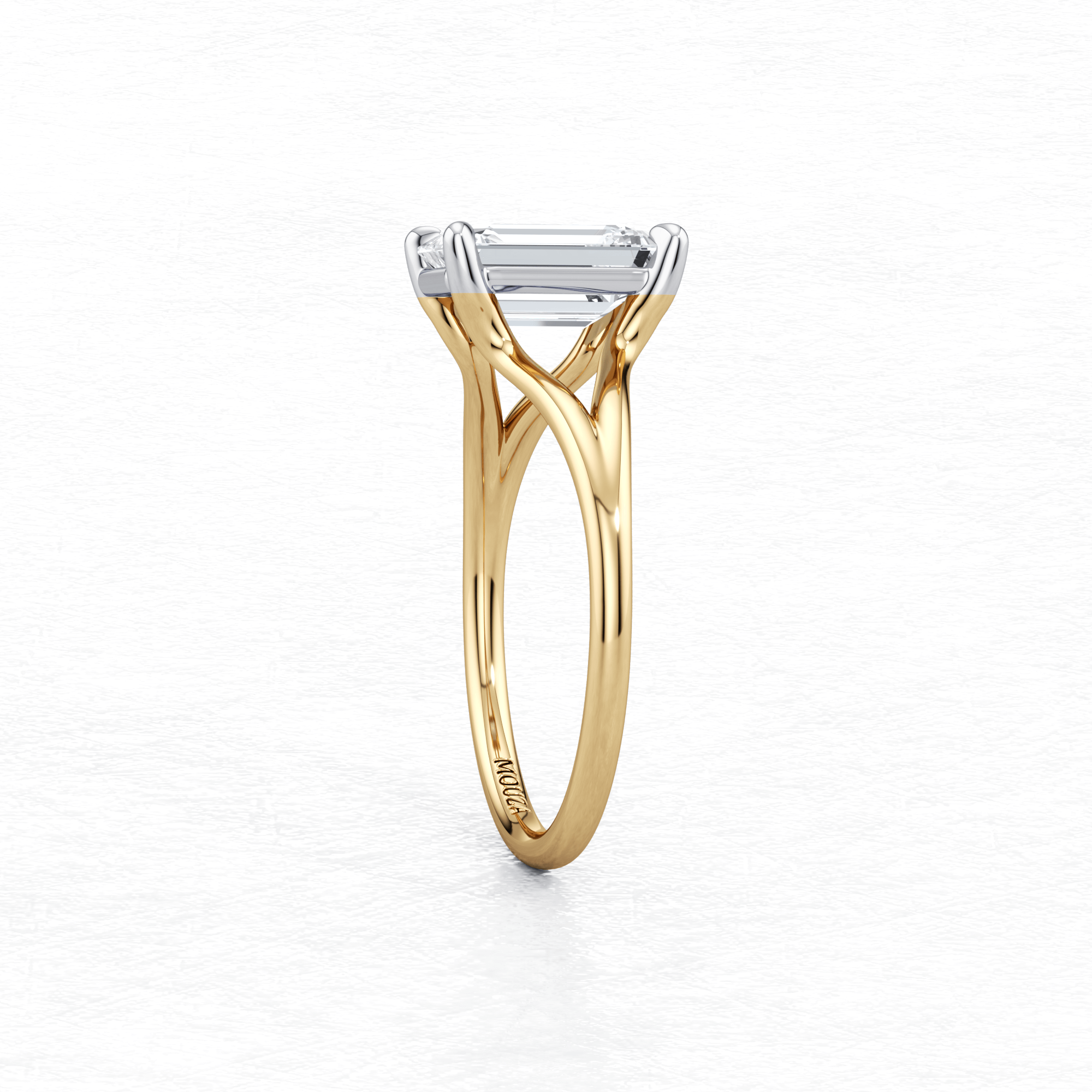 Elegant Two Tone Maggy Solitaire Engagement Ring featuring a split shank that elegantly frames the centre stone and brand name Mouza on the metal band.