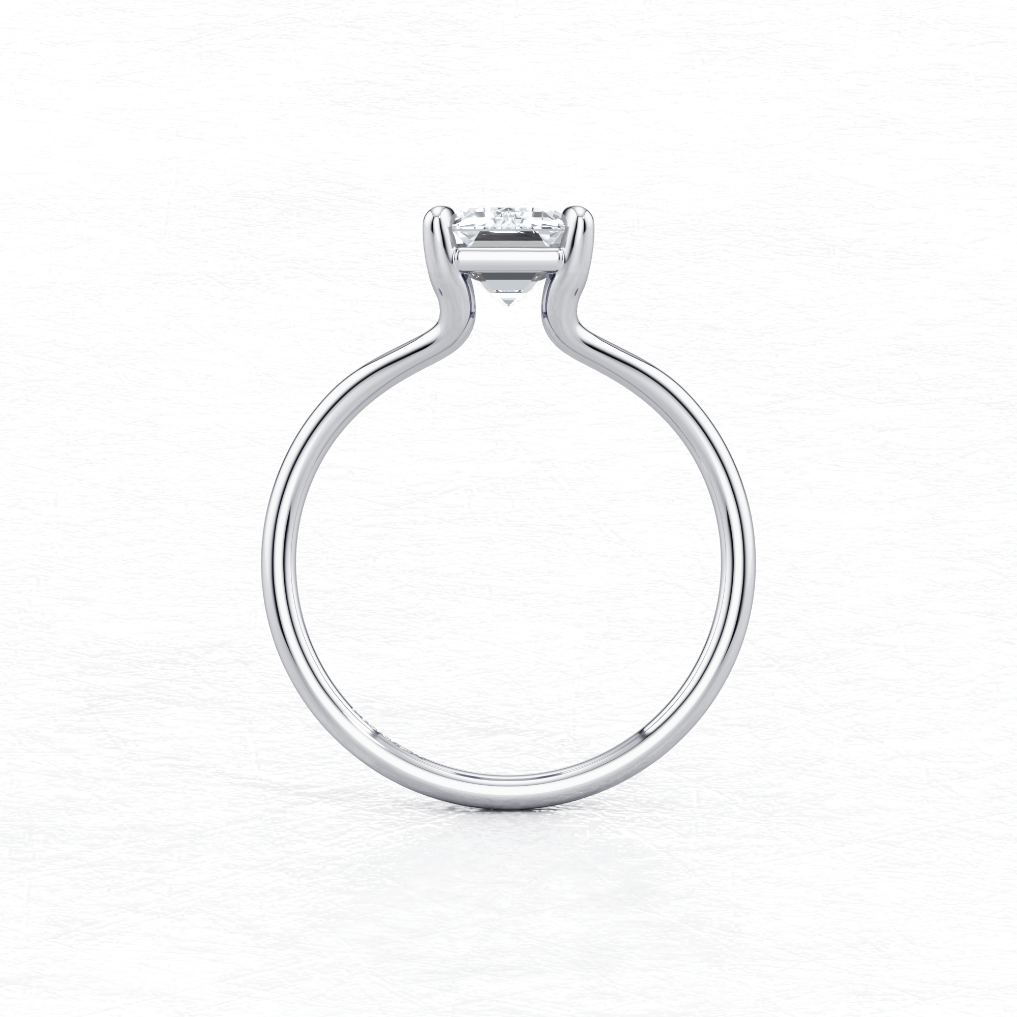 Elegant White Gold Maggy Solitaire Engagement Ring having a sleek and contemporary design from Mouza, Hatton Garden