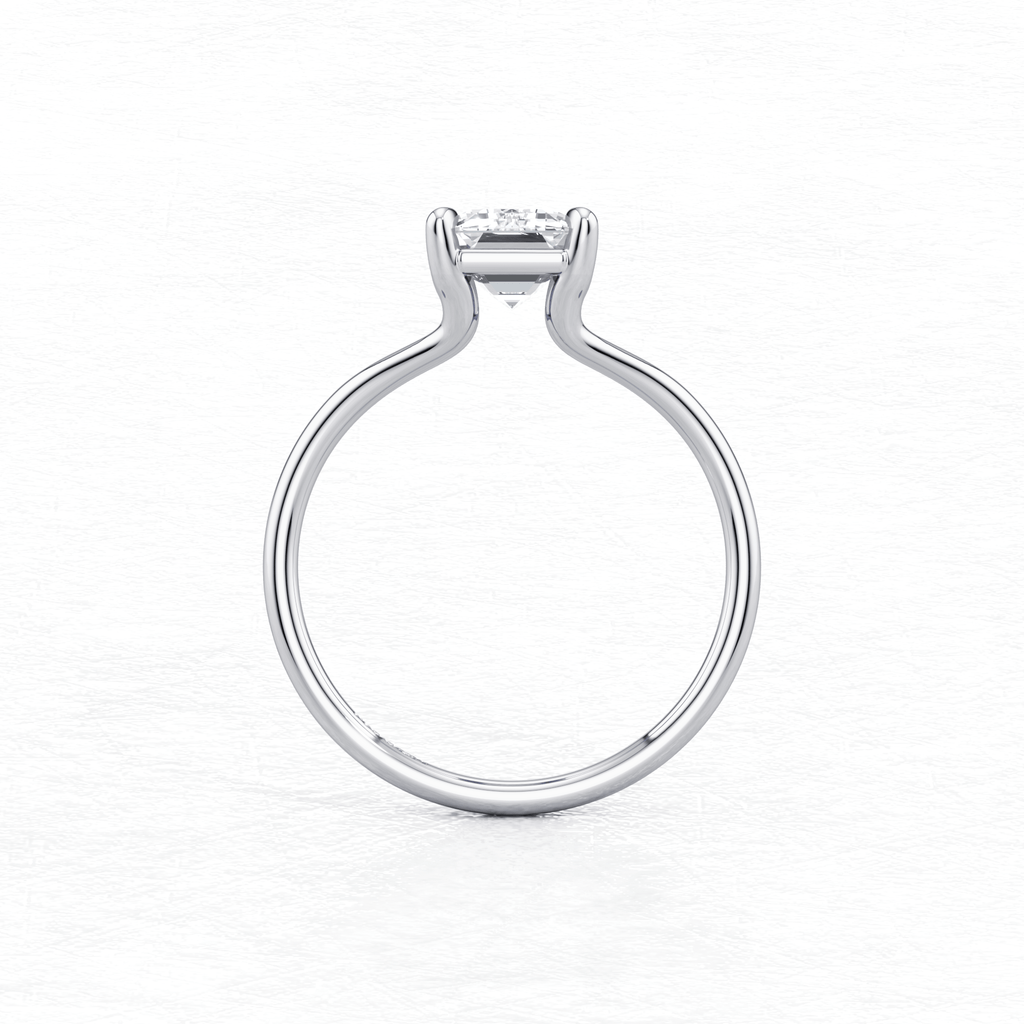 Elegant White Gold Maggy Solitaire Engagement Ring having a sleek and contemporary design from Mouza, Hatton Garden