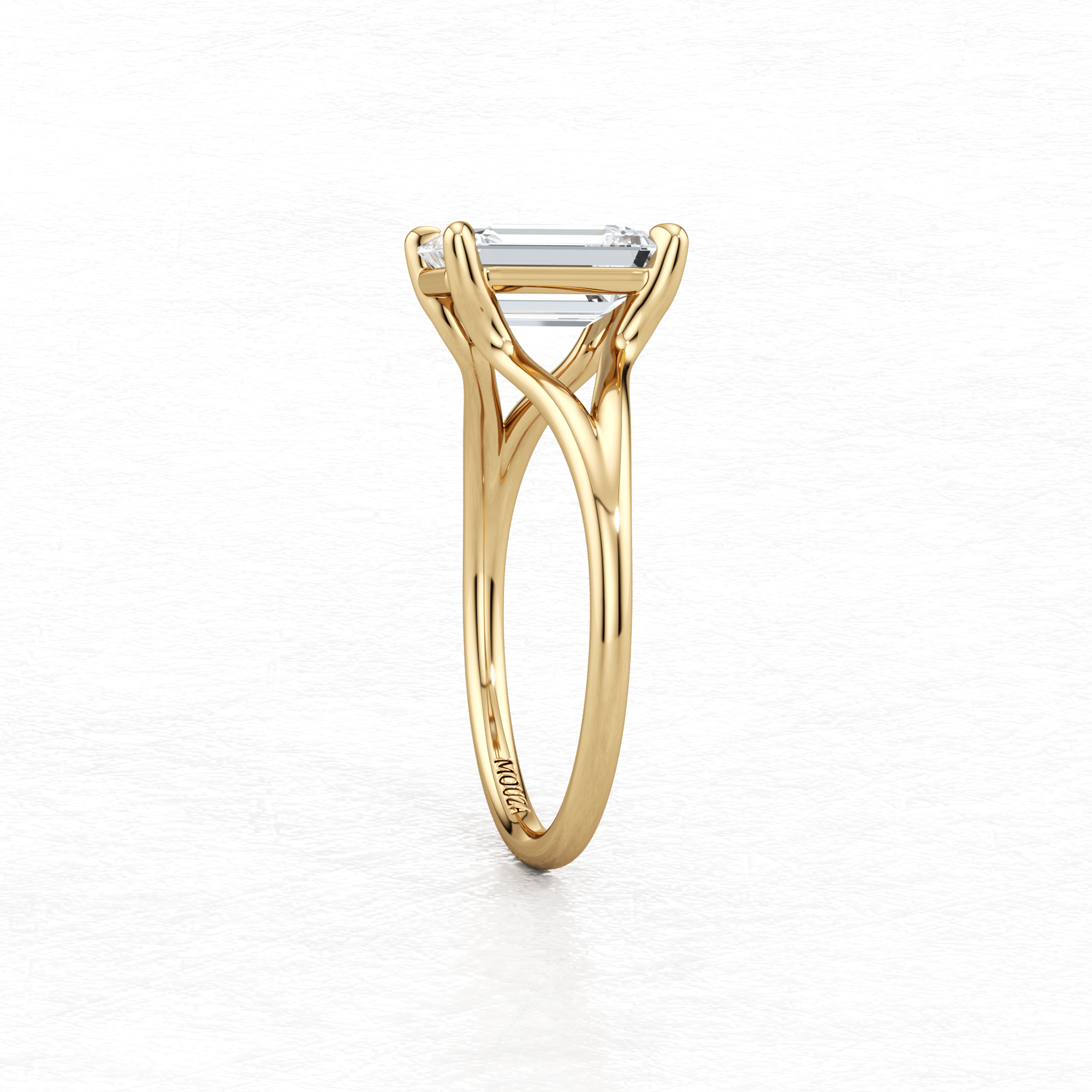 Elegant Maggy Solitaire Engagement Ring having brand name Mouza engraved on the yellow gold band 