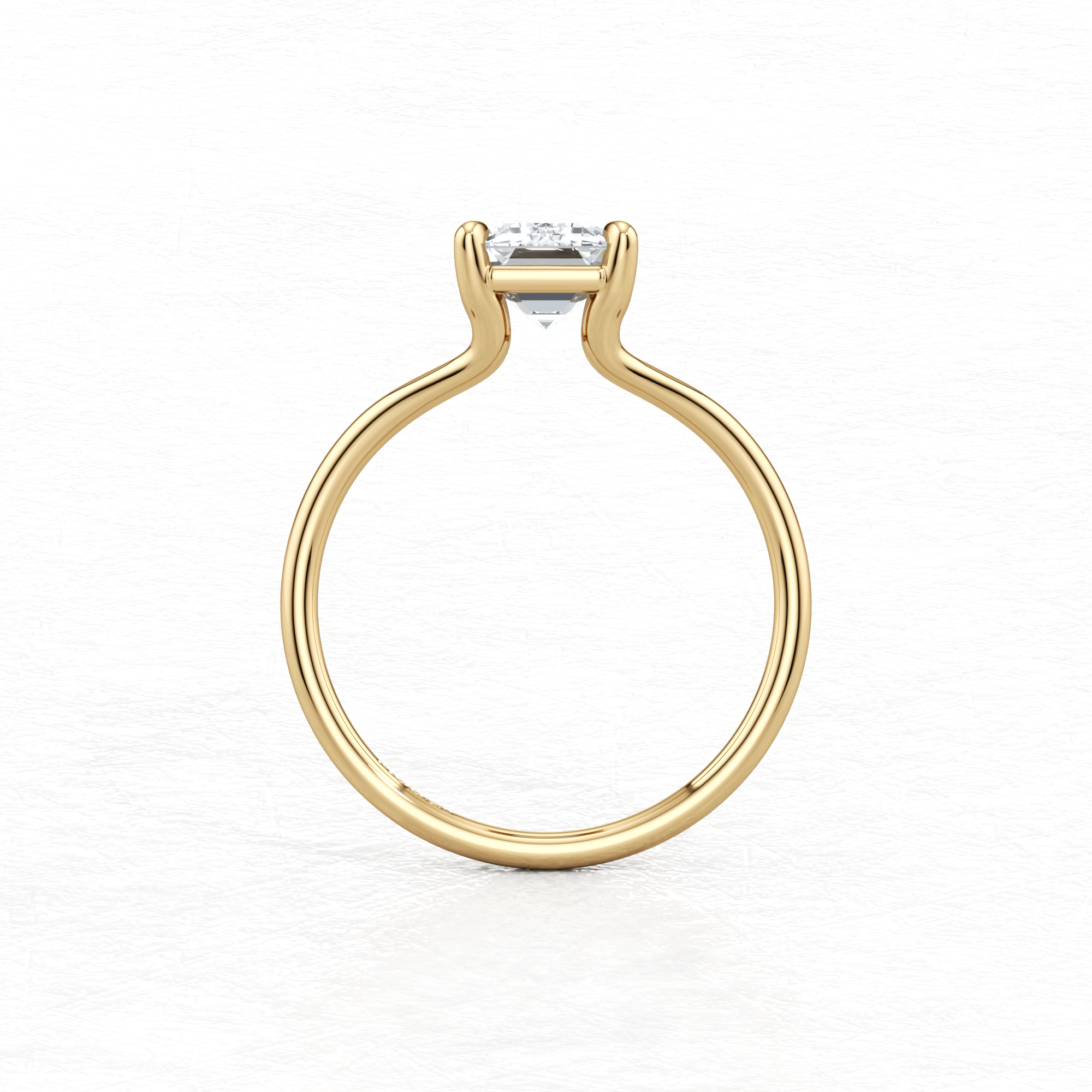 Yellow Gold Maggy Solitaire Engagement Ring having a sleek and contemporary design from Mouza, Hatton Garden