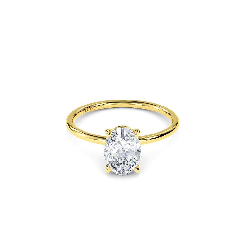 Dainty gold oval solitaire engagement ring with talon claws